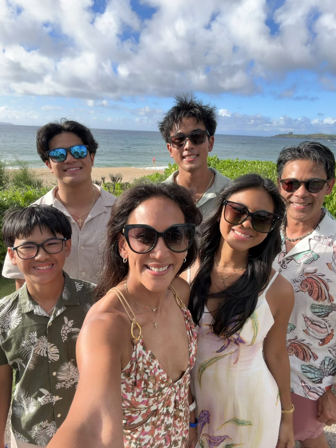 Dr. Valerie Woo with her family on a Maui beach